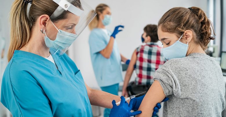 Pfizer says its COVID-19 vaccine is very effective in children 12 years and older