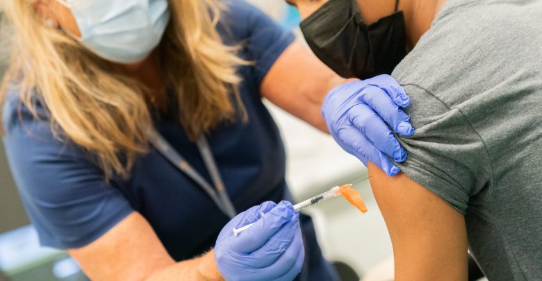 The U.S. teachers union says the surge in Covid cases in children has resulted in mandatory shots being taken