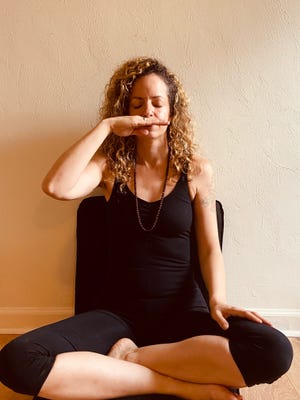 Meditation Steps: Bring your left hand under your nostrils and feel the air flowing in and out of your nostrils on your hands.