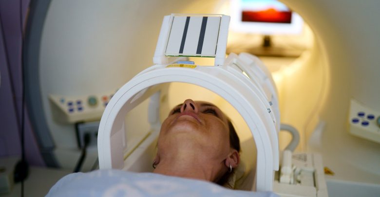 Woman receiving MRI scan.