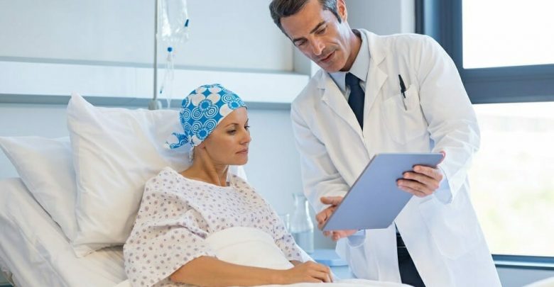 doctor with cancer patient