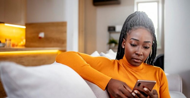 woman-looking-at-phone-for-mental-health-app