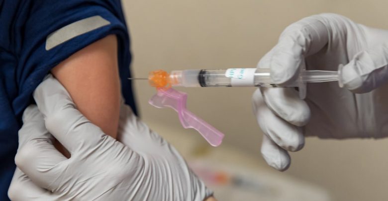 boy getting vaccinated