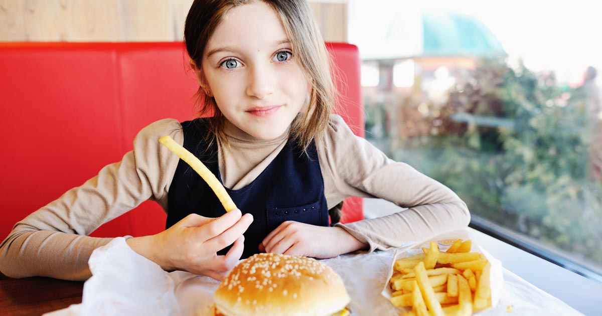 child at fast food restaurant
