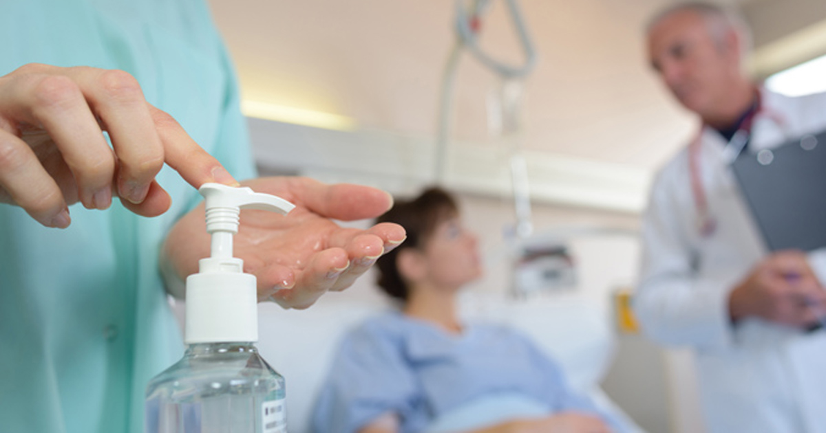 Medical worker and hand sanitizer