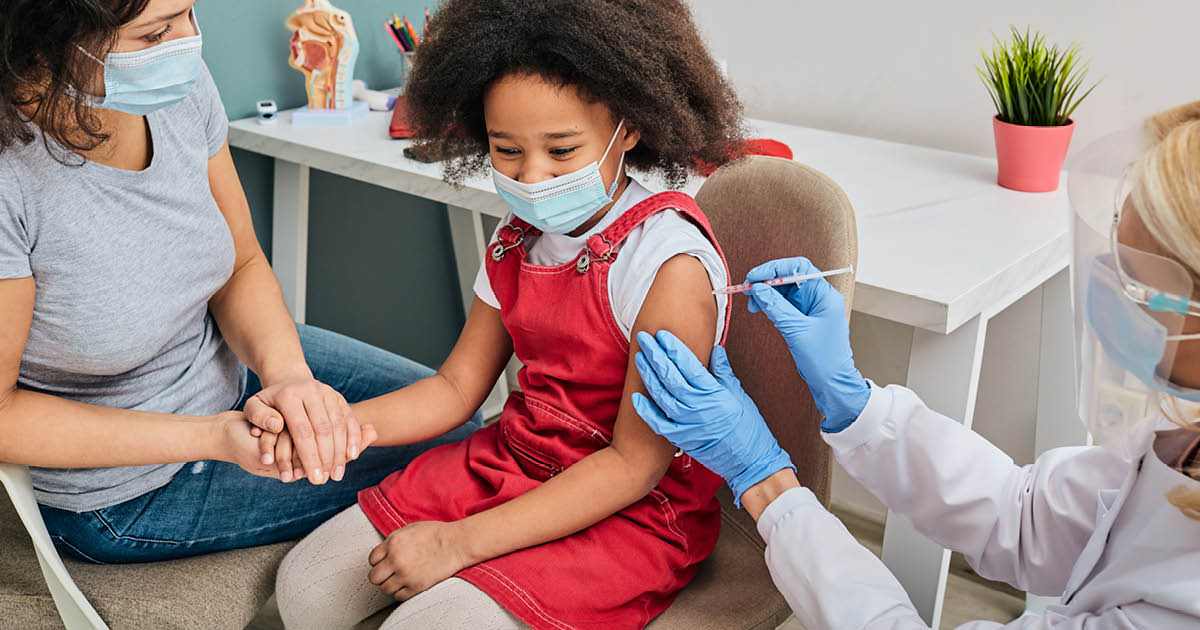 Child being vaccinated (Adobe Stock)